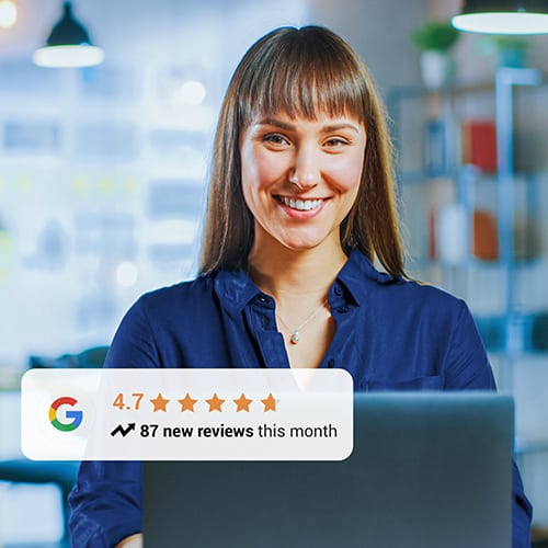 Young Brunette Works on a Laptop Computer in Cool Crea